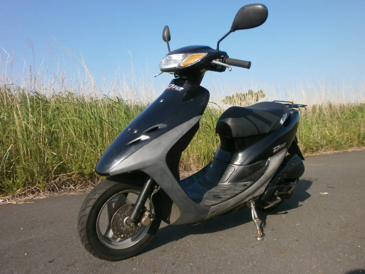 B12-14 ホンダ ライブディオ ZX AF35 バッテリーカバー レバー トリム
