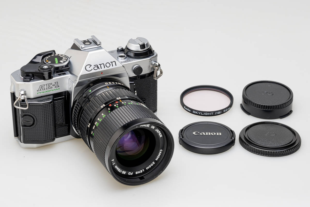 Canon AE-1 Black + New FD 35-70mm F4 Canon AE-1 black SLR 35mm