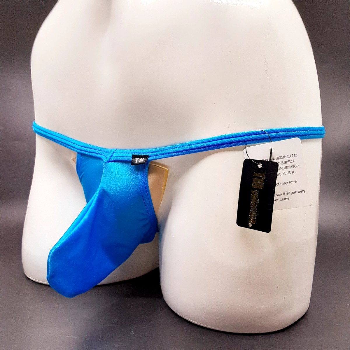【未使用】TMCollection Shinysmooth Vcut JUST IM Tバックビキニ Mサイズ NEON 蛍光ブルー 商品