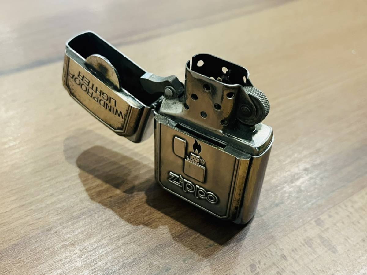 【やや傷や汚れあり】T4481 1円～【火花散ります】Zippo ジッポー トリックメタル 1997年製 WINDPROOF LIGHTER