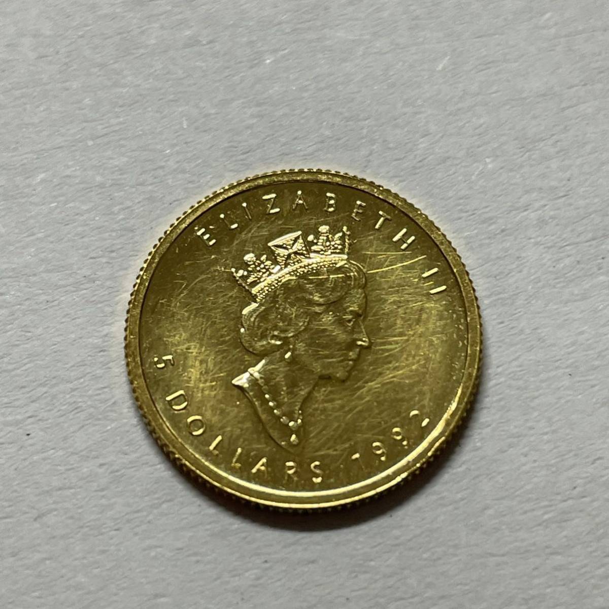 ﾒｰﾌﾟﾙ金貨1/10oz K24 5DOLLARS FINE GOLD（目立った傷や汚れなし
