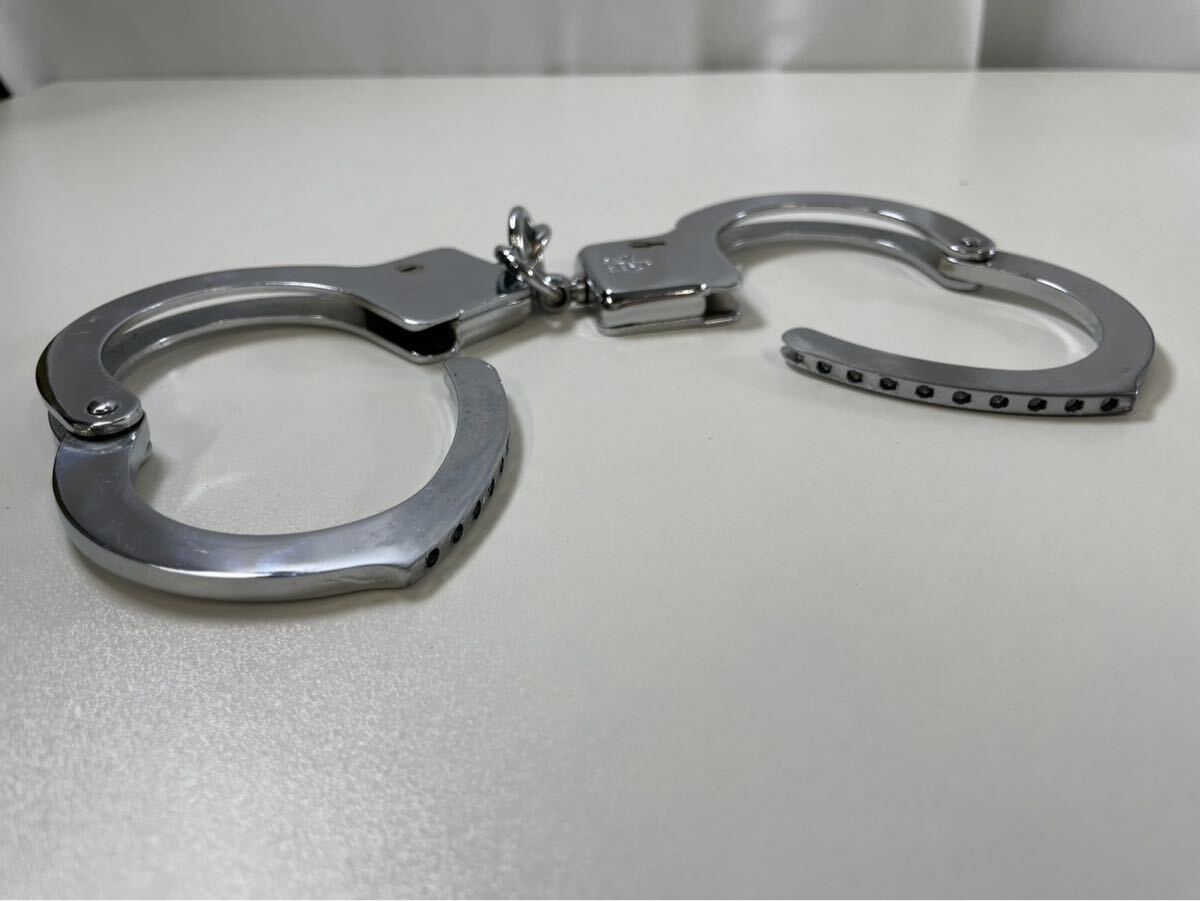 武田商店 手錠 くい込み防止 鍵付き 旭日章 警察グッズの落札情報詳細