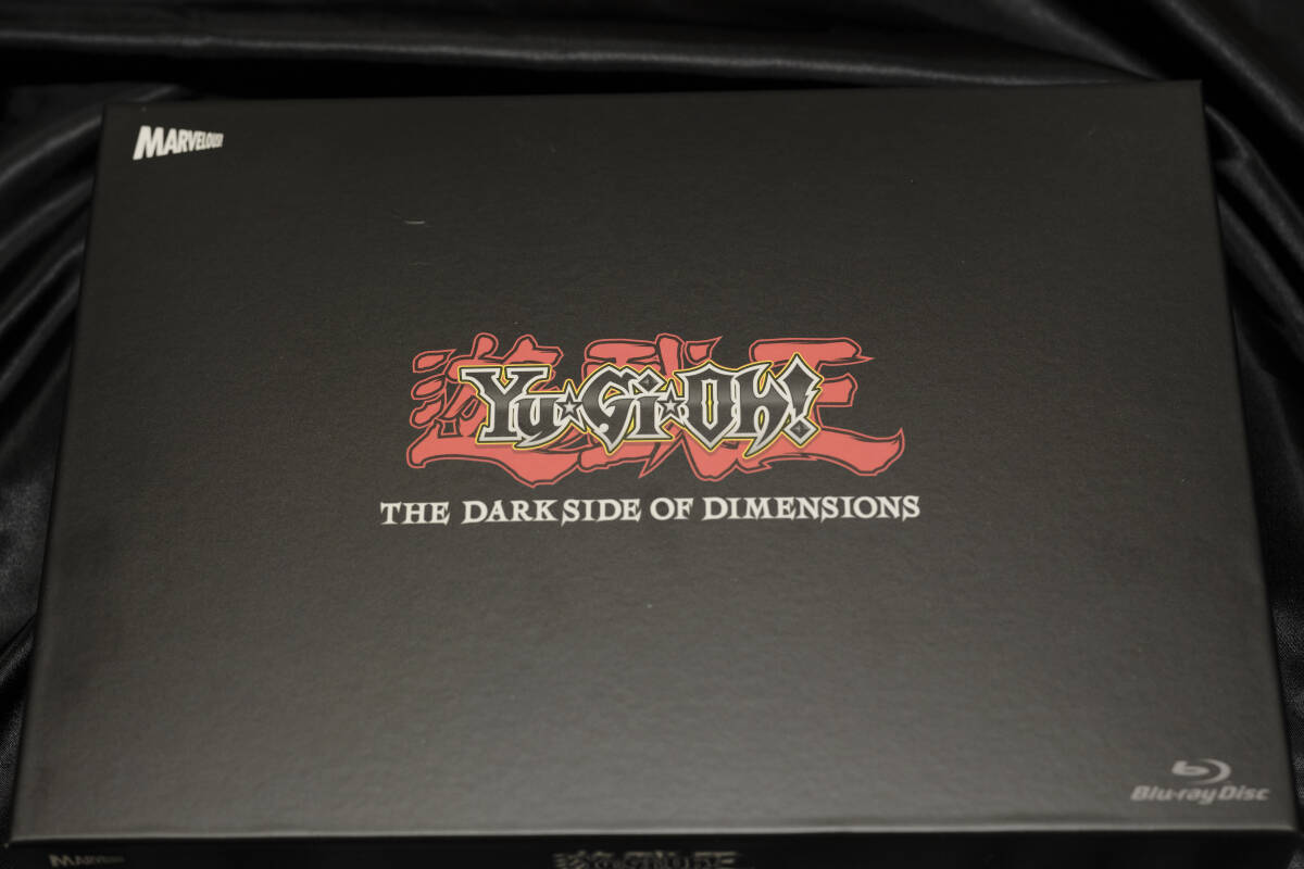 新品】劇場版 遊戯王 THE DARK SIDE OF DIMENSIONS 設定資料の落札情報