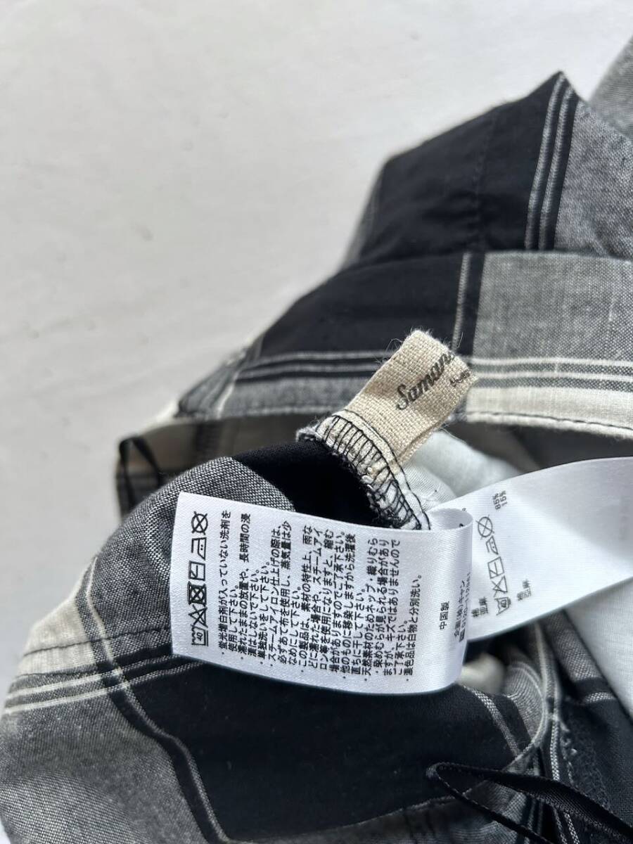 新品】新品*セクシー*エロかわ♪ざっくりスリット入*チェック柄