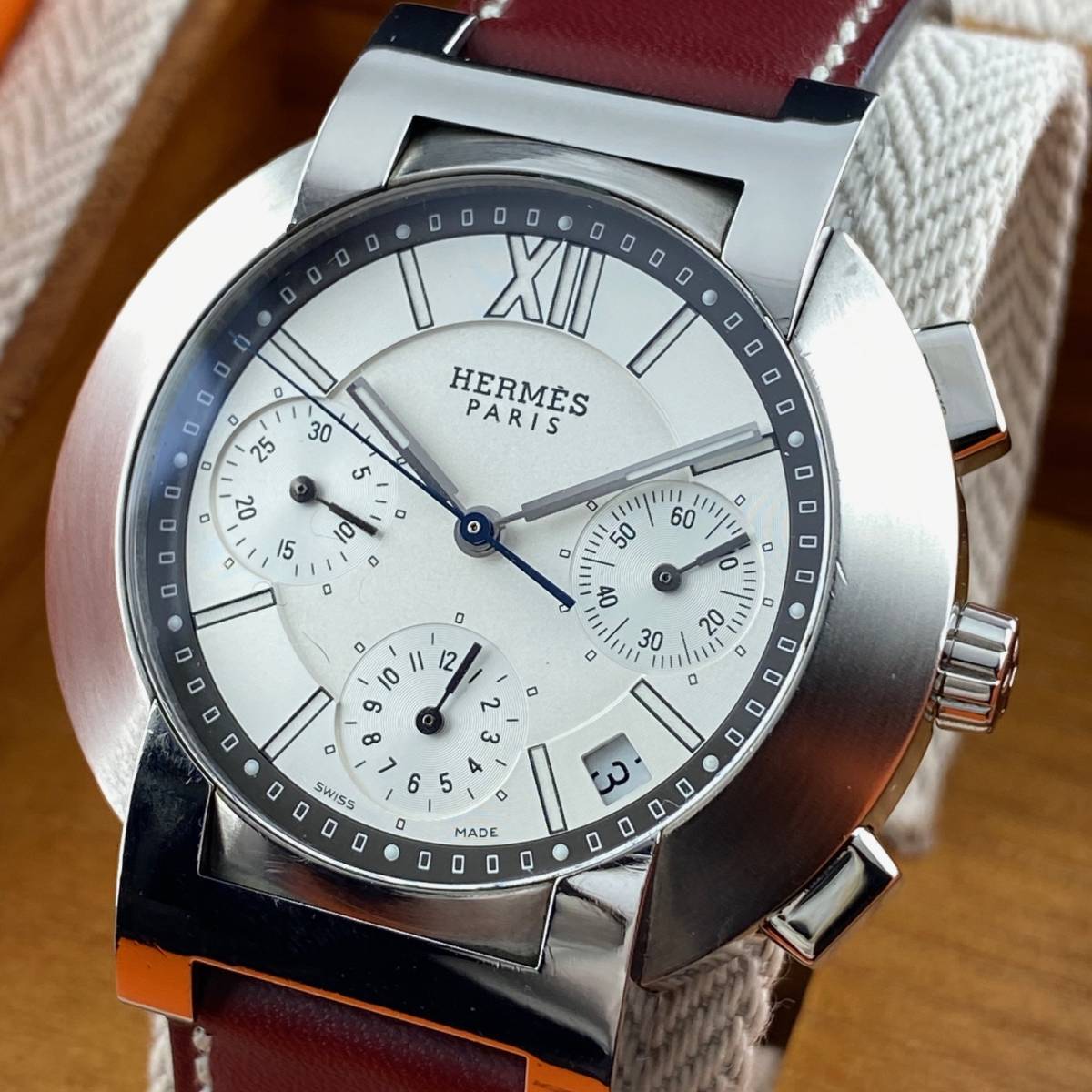 HERMES エルメス ノマード クロノグラフ メンズ 腕時計 ホワイト