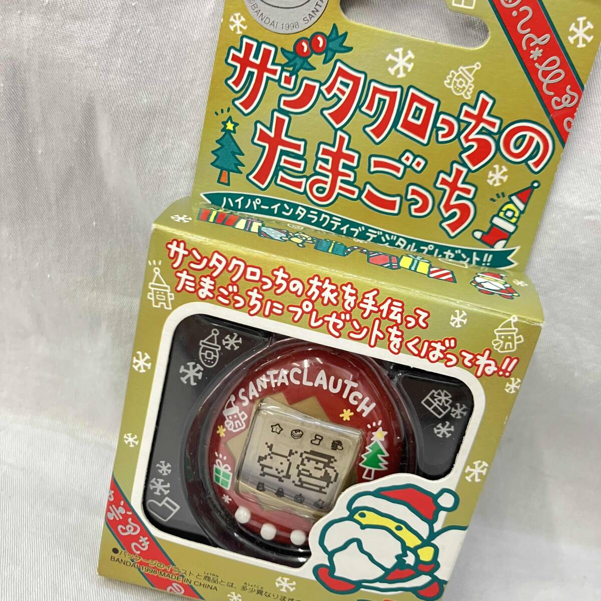 新品】新品! たまごっち クリスマスプラス 赤×緑 サンタクロっちの落札