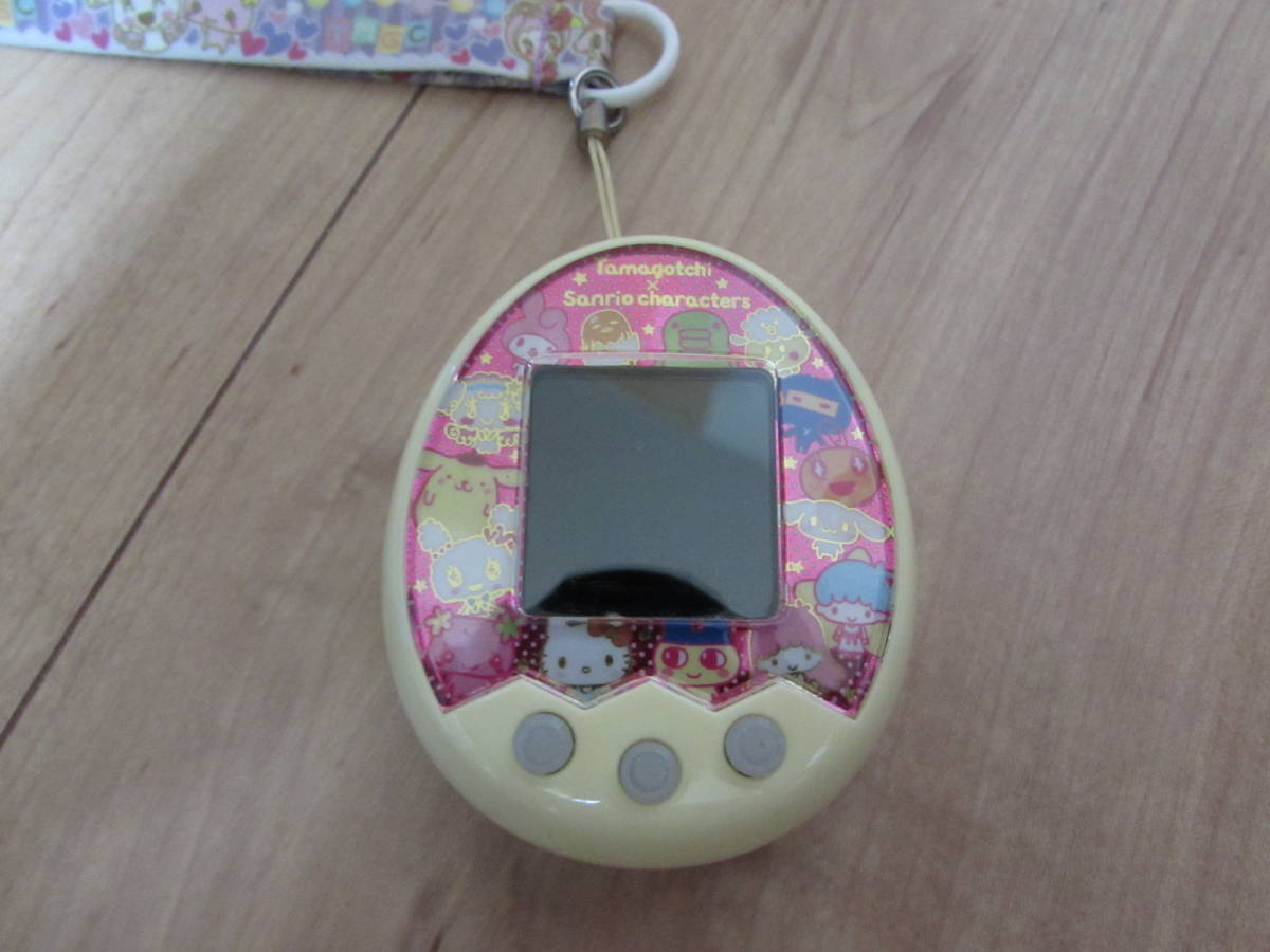 Used Tamagotchi Mixたまごっちみくす サンリオキャラクターズ M X Ver ネックストラップキュートポンポン 取扱説明書セット の落札情報詳細 ヤフオク落札価格情報 オークフリー スマートフォン版